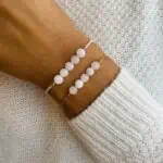 bracelet pentaperle porté double rose blanc